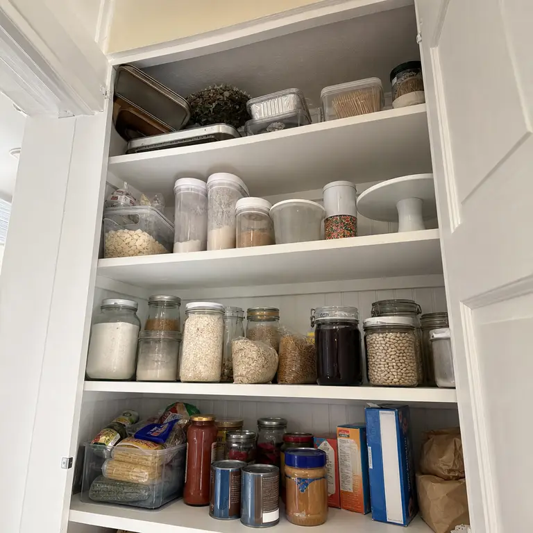 Seasonal pantry supplies are stored on the highest shelf.
